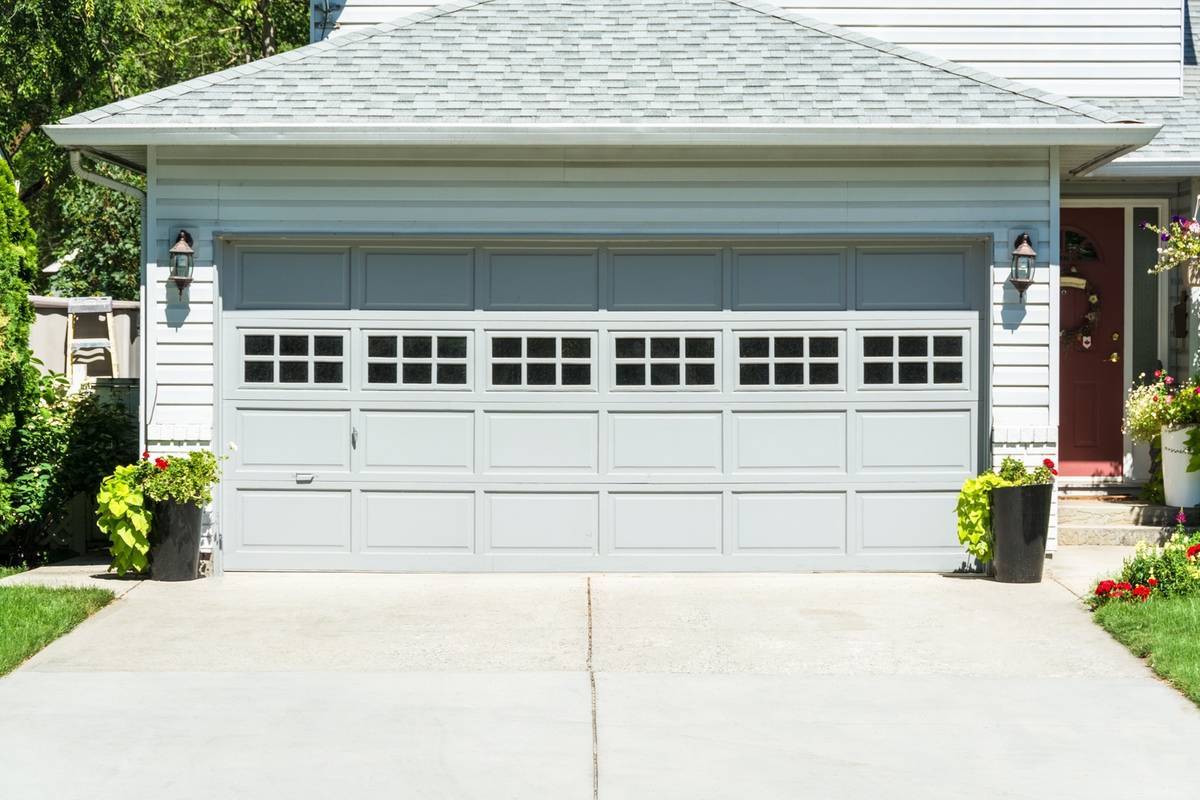 Concrete Contractors Tulsa OK 35902660 Wide Garage Door Of Residential House And Concrete Driveway In Front