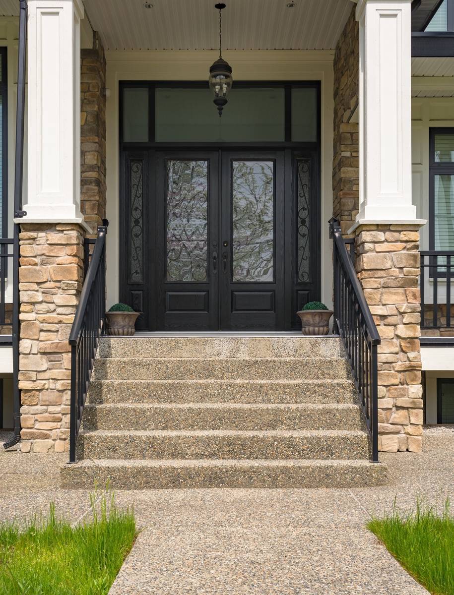 Concrete Contractors Tulsa OK 36002718 Main Entrance Of Residential House With Door Steps And Flower Pots At The Door