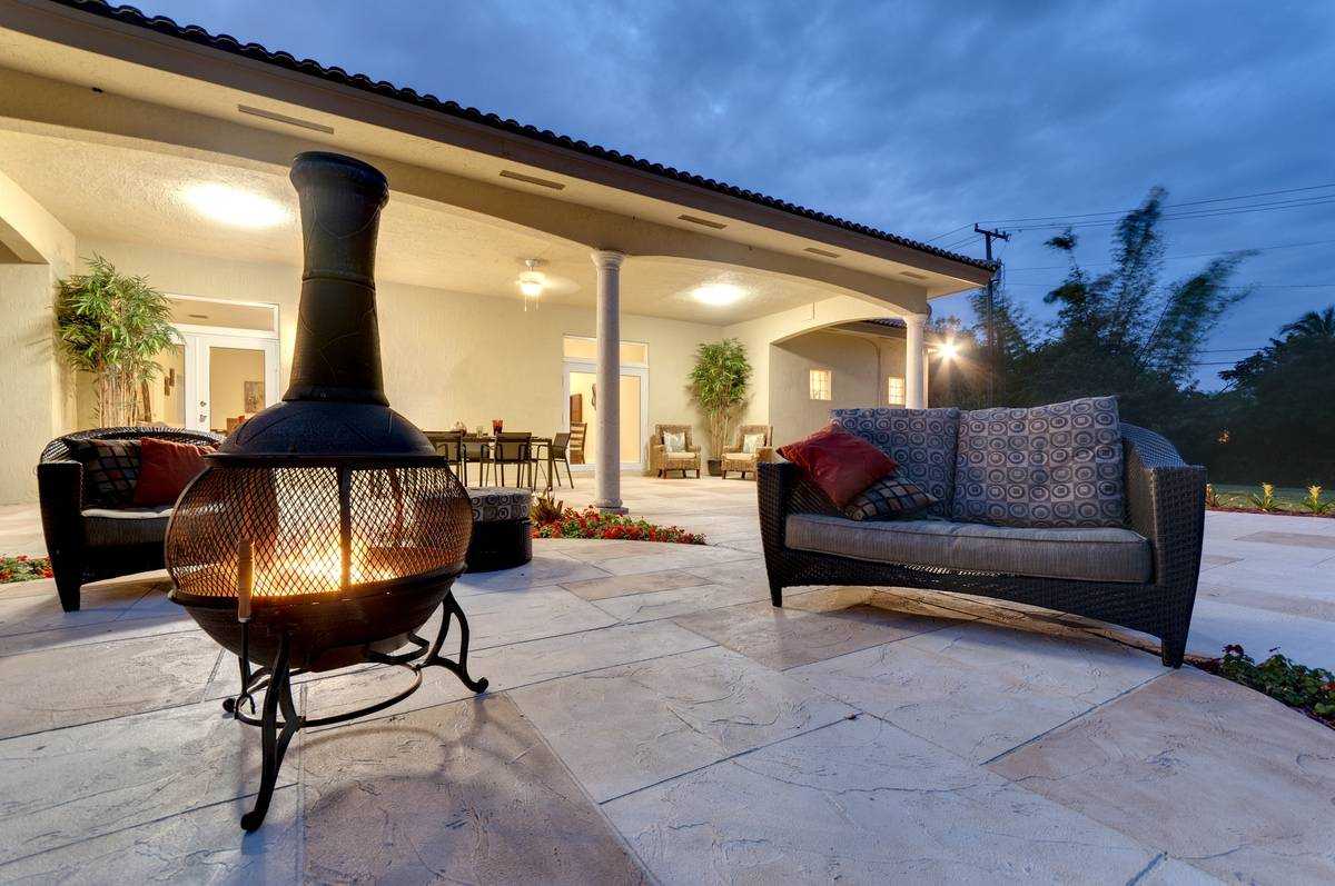 Stamped Colored Luxury Concrete Patio With Chiminea Fire Pit DPhotos 22538247